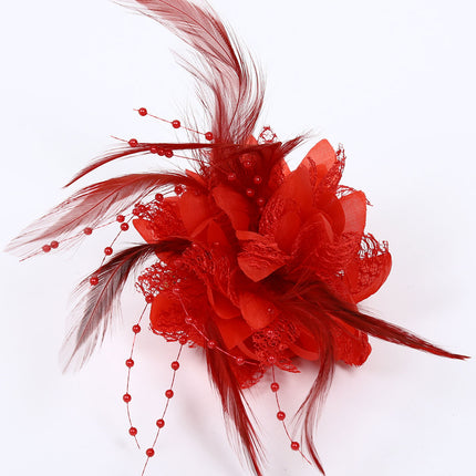 Di Bartelomeo Bloem met parels en veertjes rood