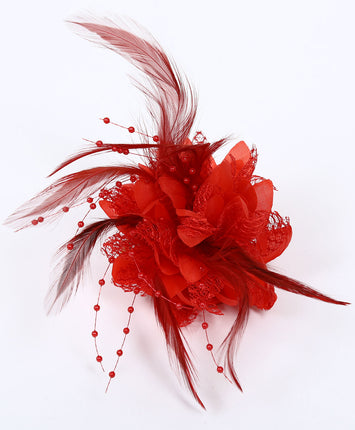 Di Bartelomeo Bloem met parels en veertjes rood