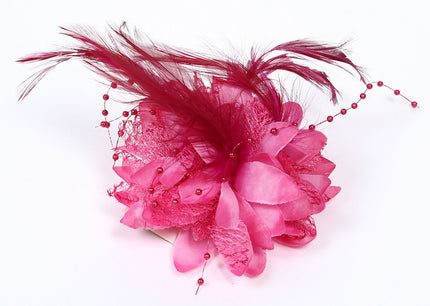 Di Bartelomeo Bloem met parels en veertjes roze